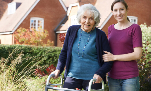 older-woman-supported-by-younger-one